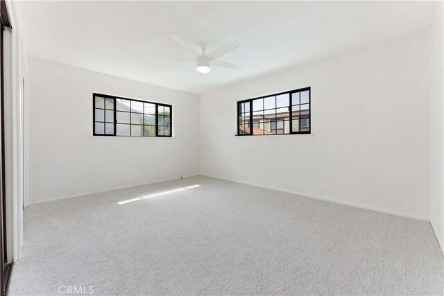 1315 E Wingate St, Covina, CA 91724 - carpeted spare room with ceiling fan and baseboards