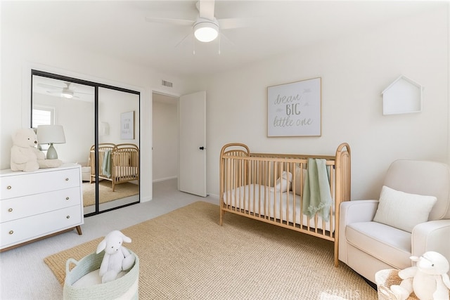 1315 E Wingate St, Covina, CA 91724 - bedroom with light carpet, a closet, a crib, and ceiling fan
