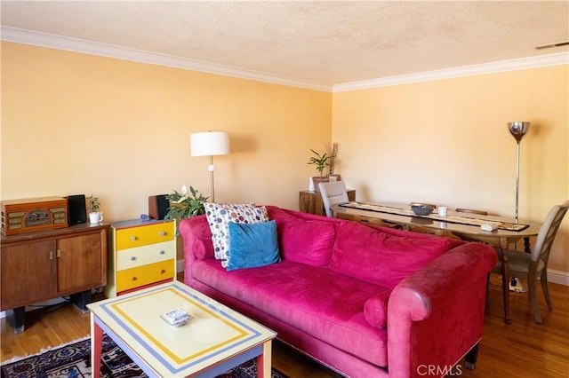 3158 Erie Ave, Merced, CA 95340 - living room featuring wood finished floors and ornamental molding