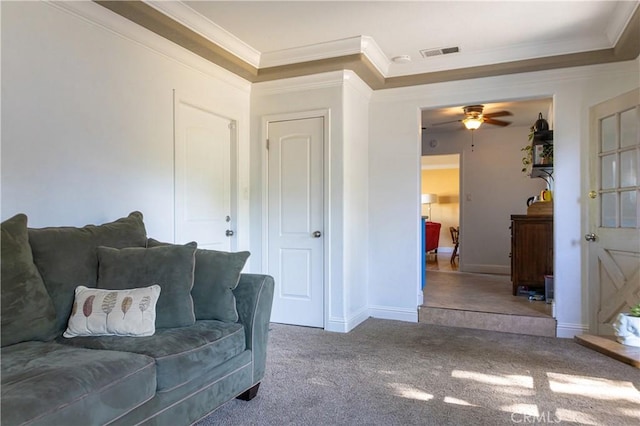 3158 Erie Ave, Merced, CA 95340 - living area featuring crown molding, carpet floors, and a ceiling fan