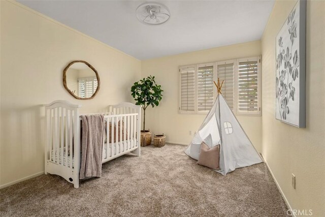 922 N Redding Way Unit E, Upland, CA 91786 - bedroom featuring carpet flooring, baseboards, and a nursery area