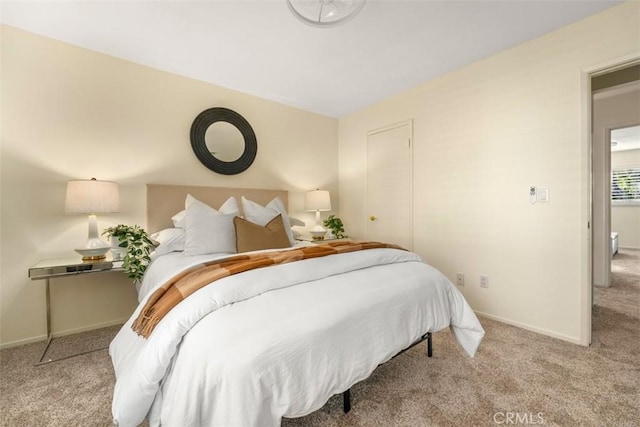 922 N Redding Way Unit E, Upland, CA 91786 - bedroom with carpet floors and baseboards