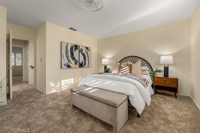 922 N Redding Way Unit E, Upland, CA 91786 - carpeted bedroom featuring baseboards