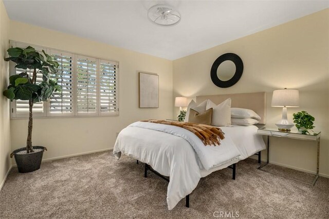 922 N Redding Way Unit E, Upland, CA 91786 - carpeted bedroom featuring baseboards