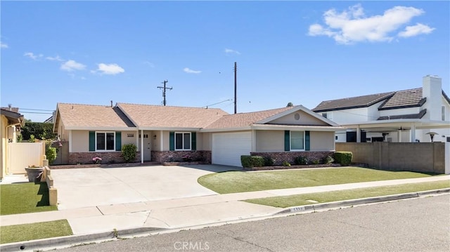5332 Huntley Ave, Garden Grove, CA 92845 - view of front of house with concrete driveway, brick siding, a garage, and stucco siding