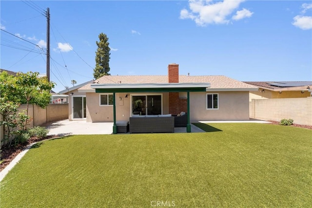 5332 Huntley Ave, Garden Grove, CA 92845 - back of property featuring a fenced backyard, a patio area, a chimney, and stucco siding