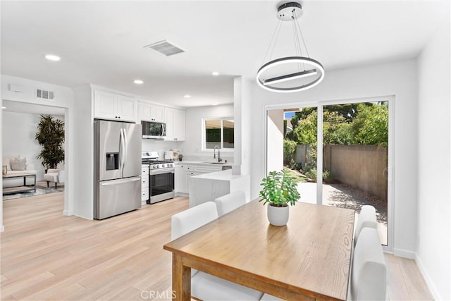 5332 Huntley Ave, Garden Grove, CA 92845 - dining space featuring light wood finished floors and recessed lighting