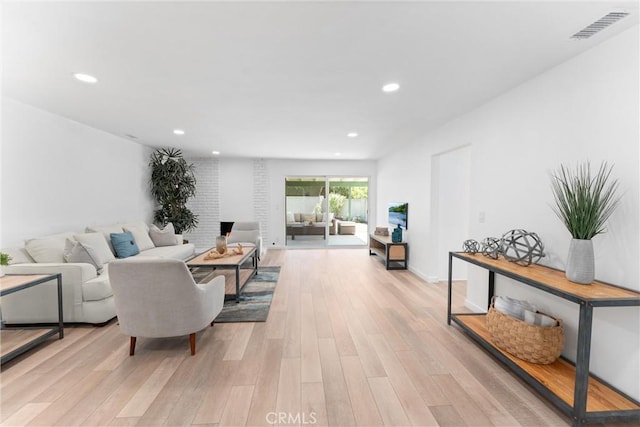 5332 Huntley Ave, Garden Grove, CA 92845 - living area featuring light wood-style floors and recessed lighting