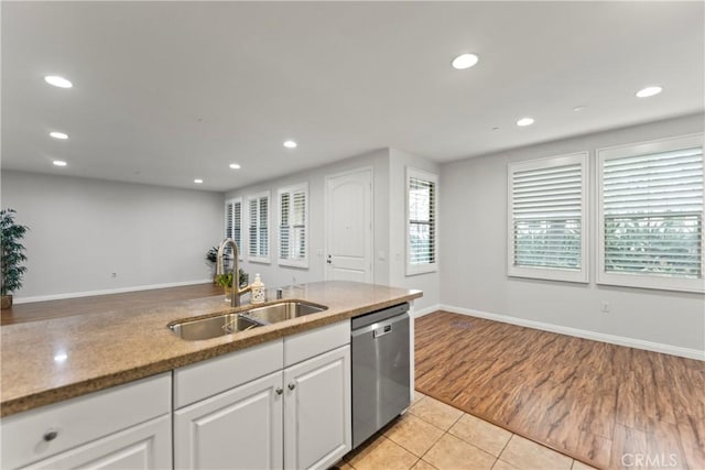 76 City Stroll, Irvine, CA 92620 - kitchen with a sink, stainless steel dishwasher, recessed lighting, white cabinets, and light tile patterned flooring