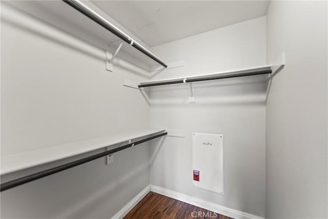 76 City Stroll, Irvine, CA 92620 - spacious closet with dark wood-style floors