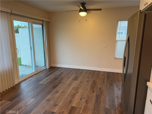 41134 Via Halcon, Temecula, CA 92591 - spare room with dark wood-style floors, ceiling fan, and baseboards