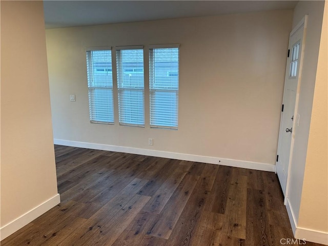 41134 Via Halcon, Temecula, CA 92591 - spare room featuring dark wood finished floors and baseboards