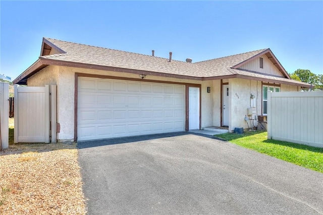 41134 Via Halcon, Temecula, CA 92591 - ranch-style home with a shingled roof, driveway, an attached garage, and stucco siding