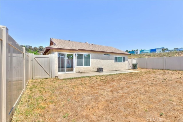 41134 Via Halcon, Temecula, CA 92591 - rear view of house with a patio, a gate, a fenced backyard, and stucco siding