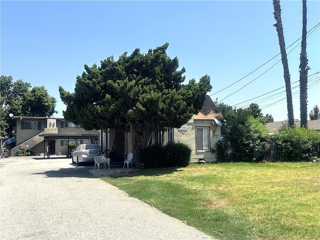 11215 Mulhall St, El Monte, CA 91731 - view of property hidden behind natural elements featuring a front yard