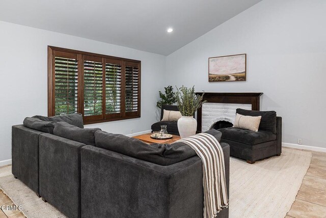 277 Aspen Dr, Monrovia, CA 91016 - living room featuring baseboards, lofted ceiling, and recessed lighting