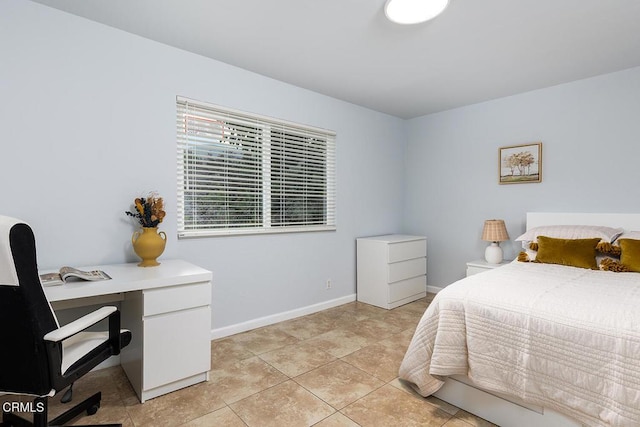 277 Aspen Dr, Monrovia, CA 91016 - bedroom featuring a desk, baseboards, and light tile patterned floors