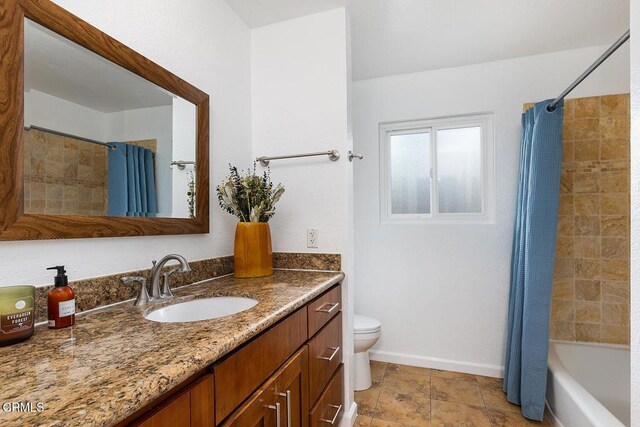 277 Aspen Dr, Monrovia, CA 91016 - full bath with vanity, baseboards, toilet, and shower / tub combo with curtain