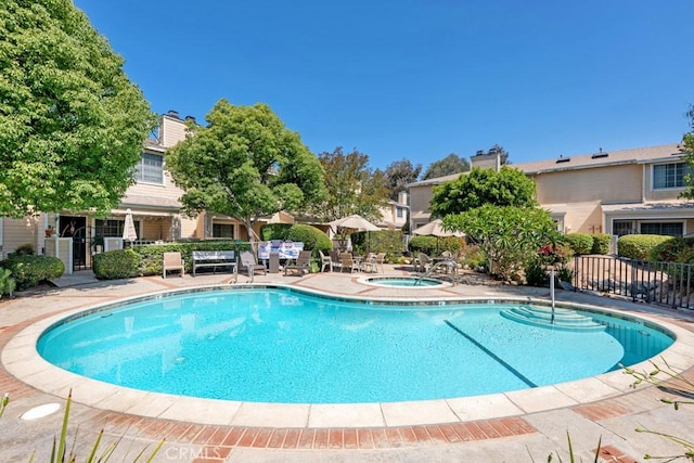 7038 De Celis Pl Unit 9, Van Nuys, CA 91406 - community pool with a hot tub and a patio