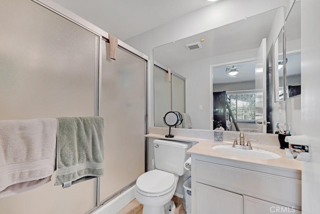7038 De Celis Pl Unit 9, Van Nuys, CA 91406 - bathroom featuring vanity, toilet, and a shower stall