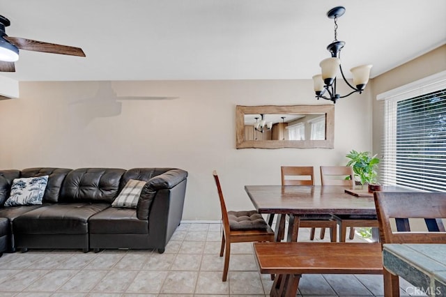 7038 De Celis Pl Unit 9, Van Nuys, CA 91406 - dining area with a chandelier and a ceiling fan