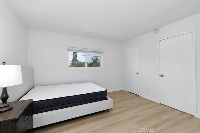 12105 Ramona Blvd, El Monte, CA 91732 - bedroom featuring wood finished floors