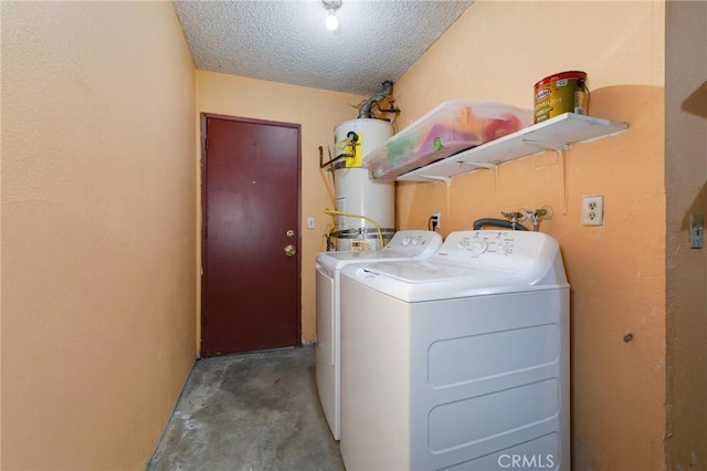 12105 Ramona Blvd, El Monte, CA 91732 - laundry room featuring washer and clothes dryer, strapped water heater, and a textured ceiling