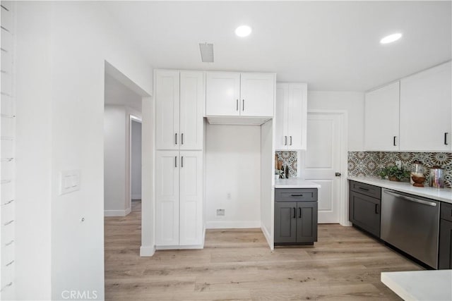 957 N Jasmine Ave, Ontario, CA 91762 - kitchen featuring dishwasher, light wood finished floors, white cabinetry, light countertops, and recessed lighting