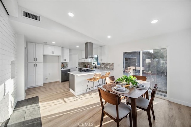 957 N Jasmine Ave, Ontario, CA 91762 - dining space featuring light wood-type flooring, recessed lighting, and baseboards