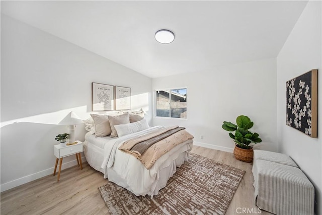 957 N Jasmine Ave, Ontario, CA 91762 - bedroom featuring light wood finished floors, baseboards, and lofted ceiling