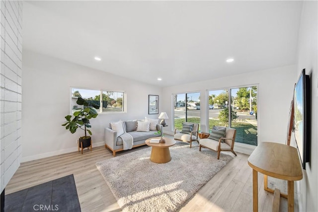 957 N Jasmine Ave, Ontario, CA 91762 - living room featuring plenty of natural light, light wood-style floors, recessed lighting, and baseboards