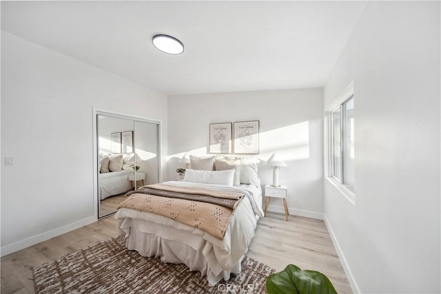 957 N Jasmine Ave, Ontario, CA 91762 - bedroom featuring light wood-style flooring, baseboards, and a closet