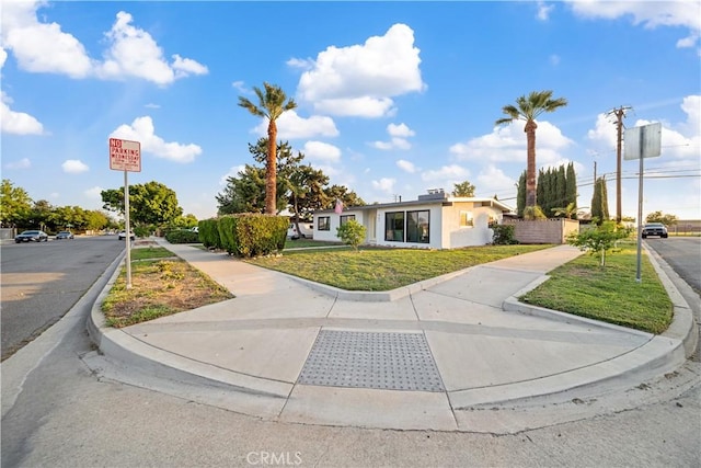 957 N Jasmine Ave, Ontario, CA 91762 - view of front of house featuring a front lawn