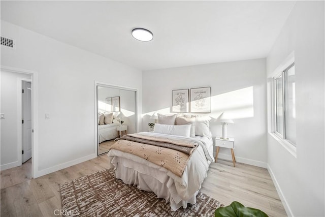 957 N Jasmine Ave, Ontario, CA 91762 - bedroom featuring light wood-style floors, baseboards, and a closet