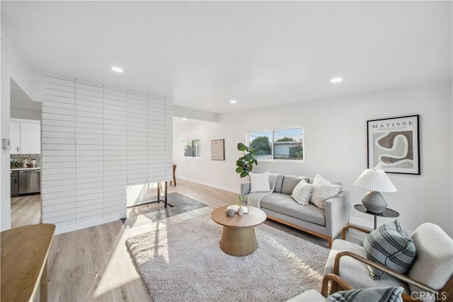 957 N Jasmine Ave, Ontario, CA 91762 - living room featuring light wood-style floors and recessed lighting