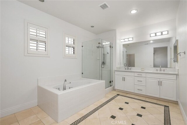 211 Groveland, Irvine, CA 92620 - bathroom with a shower stall, a garden tub, double vanity, tile patterned flooring, and baseboards