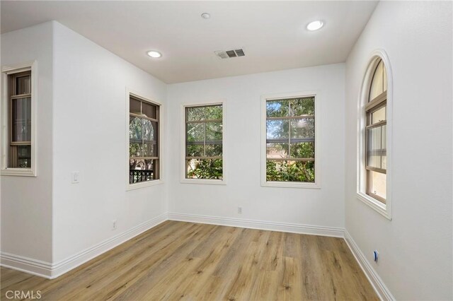 211 Groveland, Irvine, CA 92620 - unfurnished room featuring light wood-type flooring, baseboards, and recessed lighting