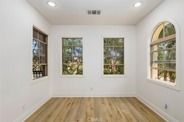 211 Groveland, Irvine, CA 92620 - empty room featuring light wood finished floors, baseboards, and recessed lighting