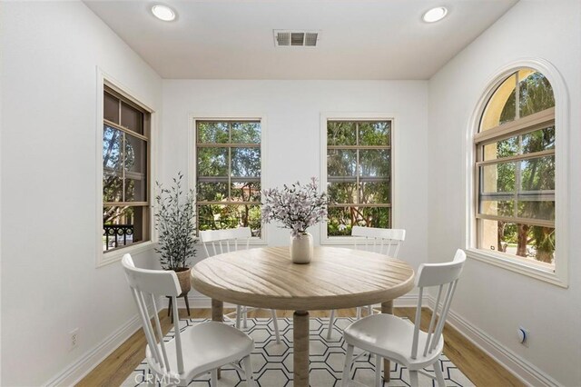 211 Groveland, Irvine, CA 92620 - dining area with wood finished floors, baseboards, and recessed lighting
