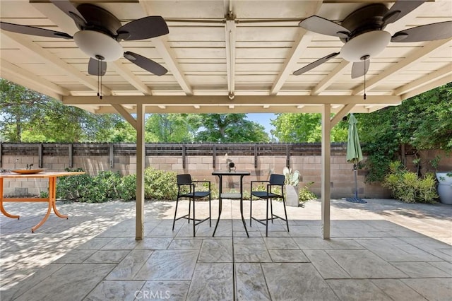 18770 Community St, Northridge, CA 91324 - fenced backyard with ceiling fan and a patio area