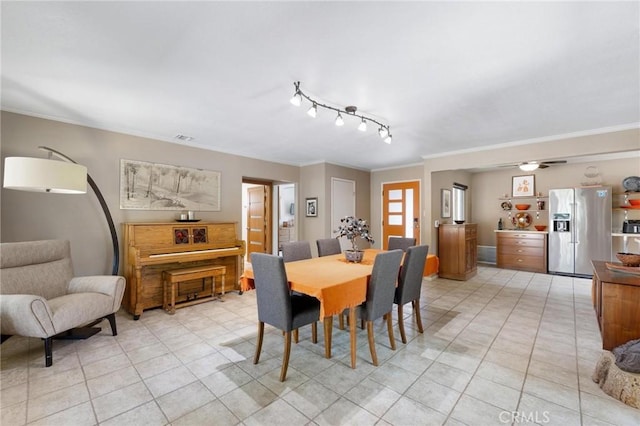18770 Community St, Northridge, CA 91324 - dining area featuring crown molding, light tile patterned floors, and a ceiling fan