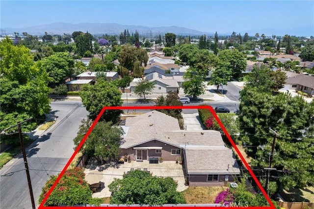 18770 Community St, Northridge, CA 91324 - aerial view of residential area featuring property parcel outlined and mountains