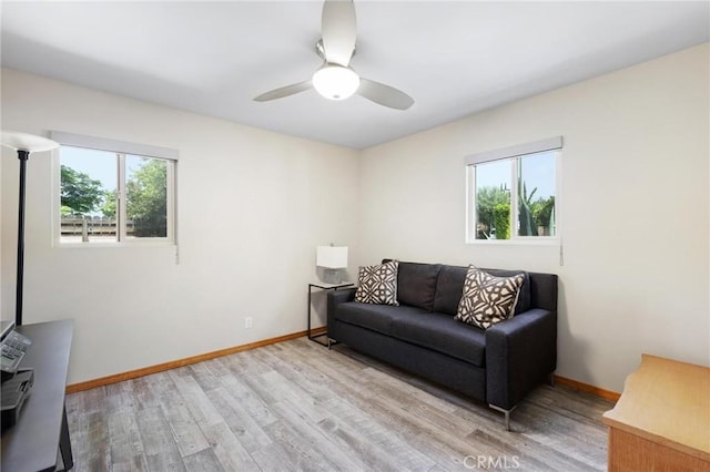 18770 Community St, Northridge, CA 91324 - living area with plenty of natural light, wood finished floors, and a ceiling fan
