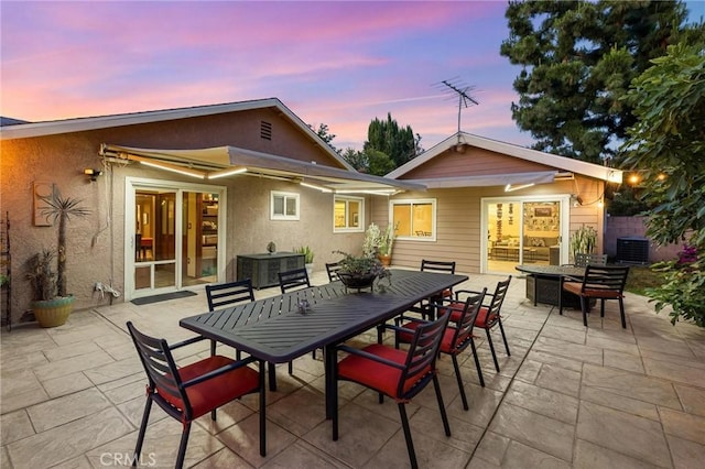 18770 Community St, Northridge, CA 91324 - view of patio / terrace with outdoor dining area and central AC unit