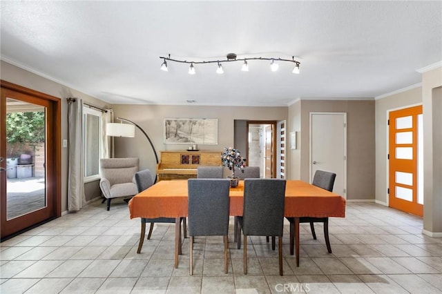 18770 Community St, Northridge, CA 91324 - dining space featuring crown molding, light tile patterned floors, and baseboards