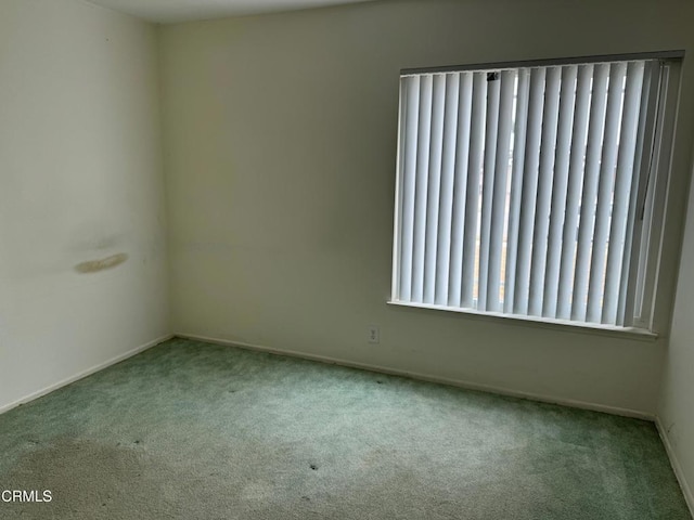1721 Joliet Pl, Oxnard, CA 93030 - spare room featuring carpet floors and baseboards