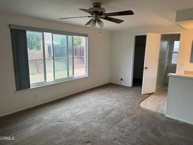 1721 Joliet Pl, Oxnard, CA 93030 - unfurnished bedroom with carpet floors, baseboards, a closet, and a ceiling fan