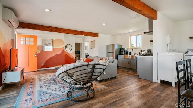 61748 Valley View Cir, Joshua Tree, CA 92252 - living room with beam ceiling, a wall mounted air conditioner, recessed lighting, and dark wood-style flooring