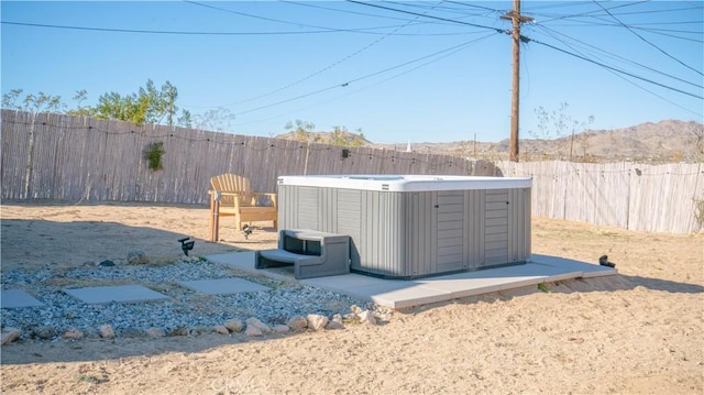 61748 Valley View Cir, Joshua Tree, CA 92252 - fenced backyard featuring a hot tub and a mountain view