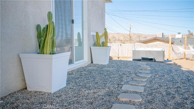 61748 Valley View Cir, Joshua Tree, CA 92252 - fenced backyard with cooling unit and a hot tub